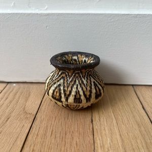 Mini decorative woven vase.